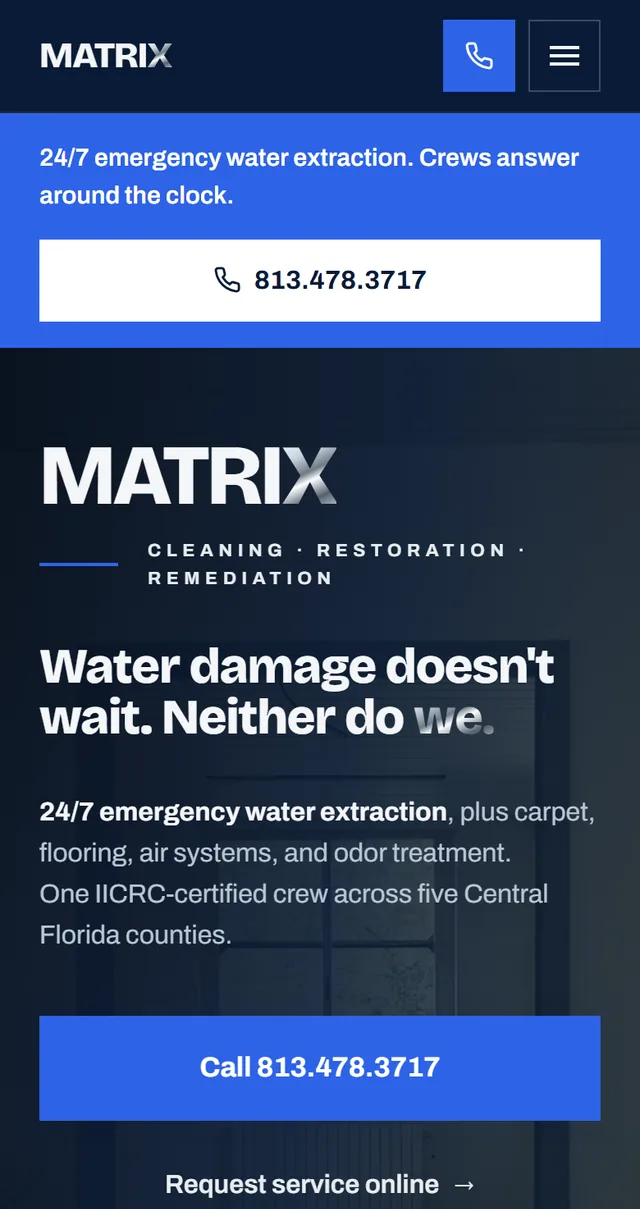 matrixrapidrestore24.com on a phone: a blue 24/7 emergency bar with a full-width tap-to-call button above the &ldquo;Water damage doesn&rsquo;t wait&rdquo; opening screen.